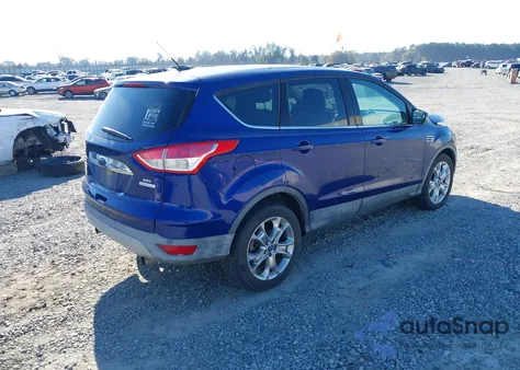 2013 Ford Escape Sel z USA, uszkodzony, nr VIN 1FMCU0H93DUB71209